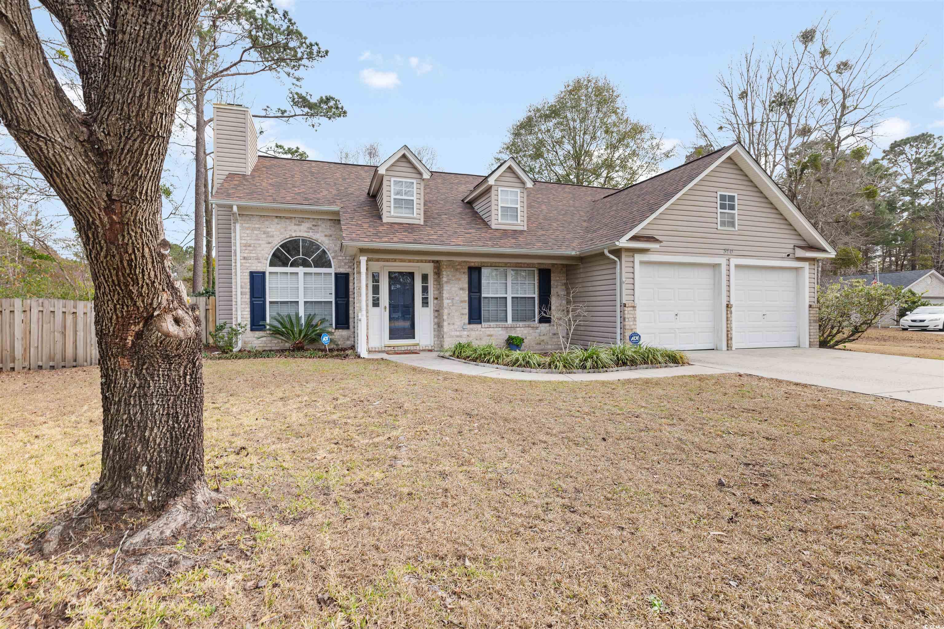 320 Muirfield Road Myrtle Beach, SC 29588 - Photo 4 of 40 View of front of property featuring a front yard a