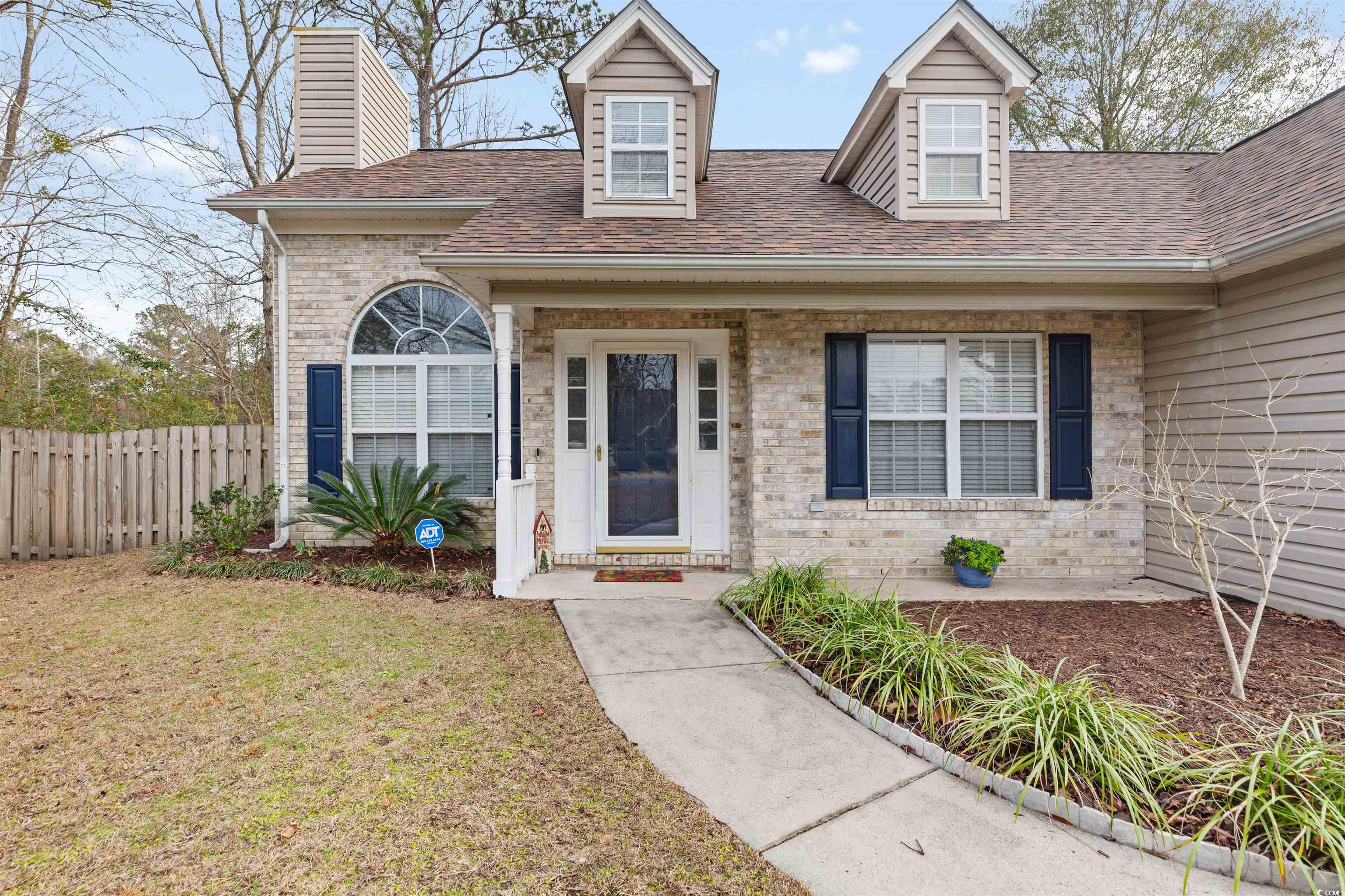 320 Muirfield Road Myrtle Beach, SC 29588 - Photo 5 of 40 View of front of home with a front lawn