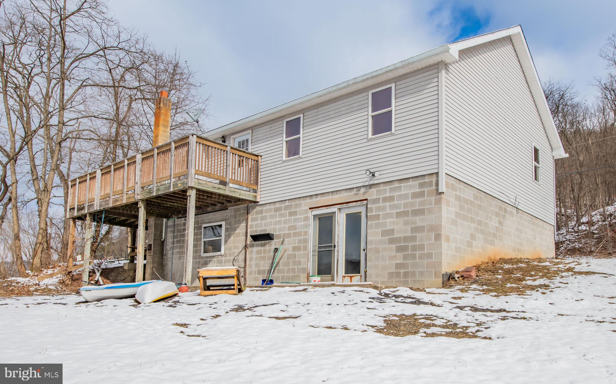 749 Farrandsville Road Lock Haven, PA 17745 - Photo 18 of 25 a view of a house with snow on the side of the road