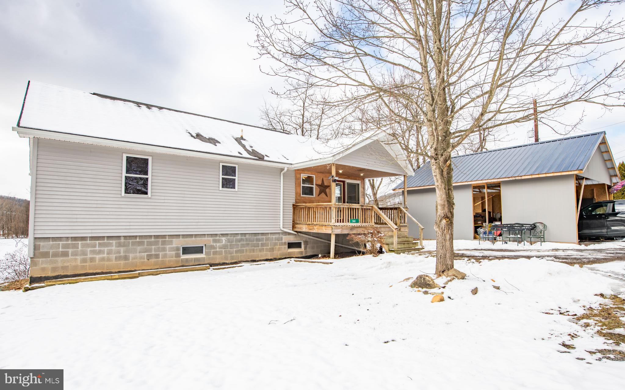 749 Farrandsville Road Lock Haven, PA 17745 - Photo 19 of 25 a view of a house with snow on the road