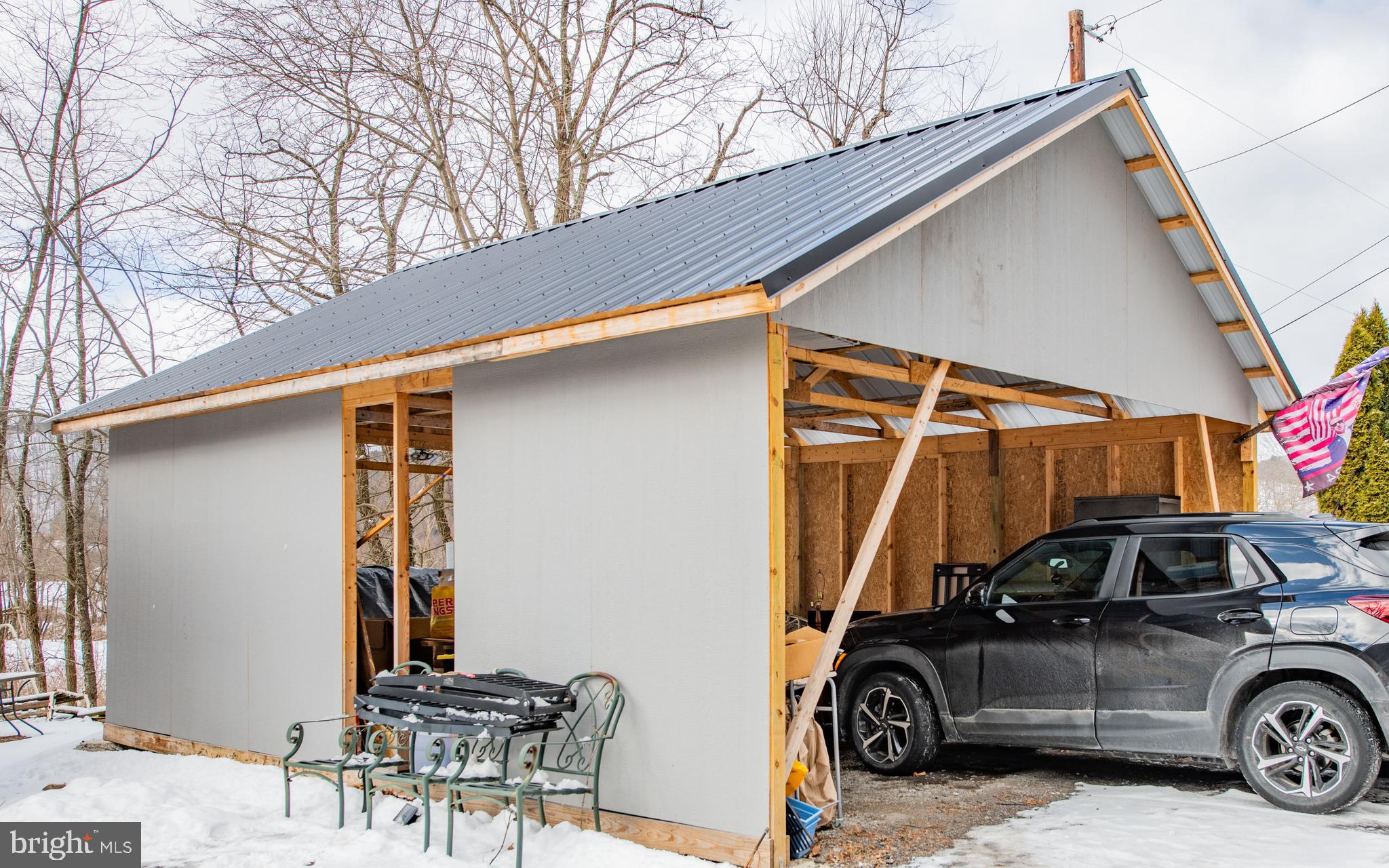 749 Farrandsville Road Lock Haven, PA 17745 - Photo 23 of 25 a car parked in front of a house