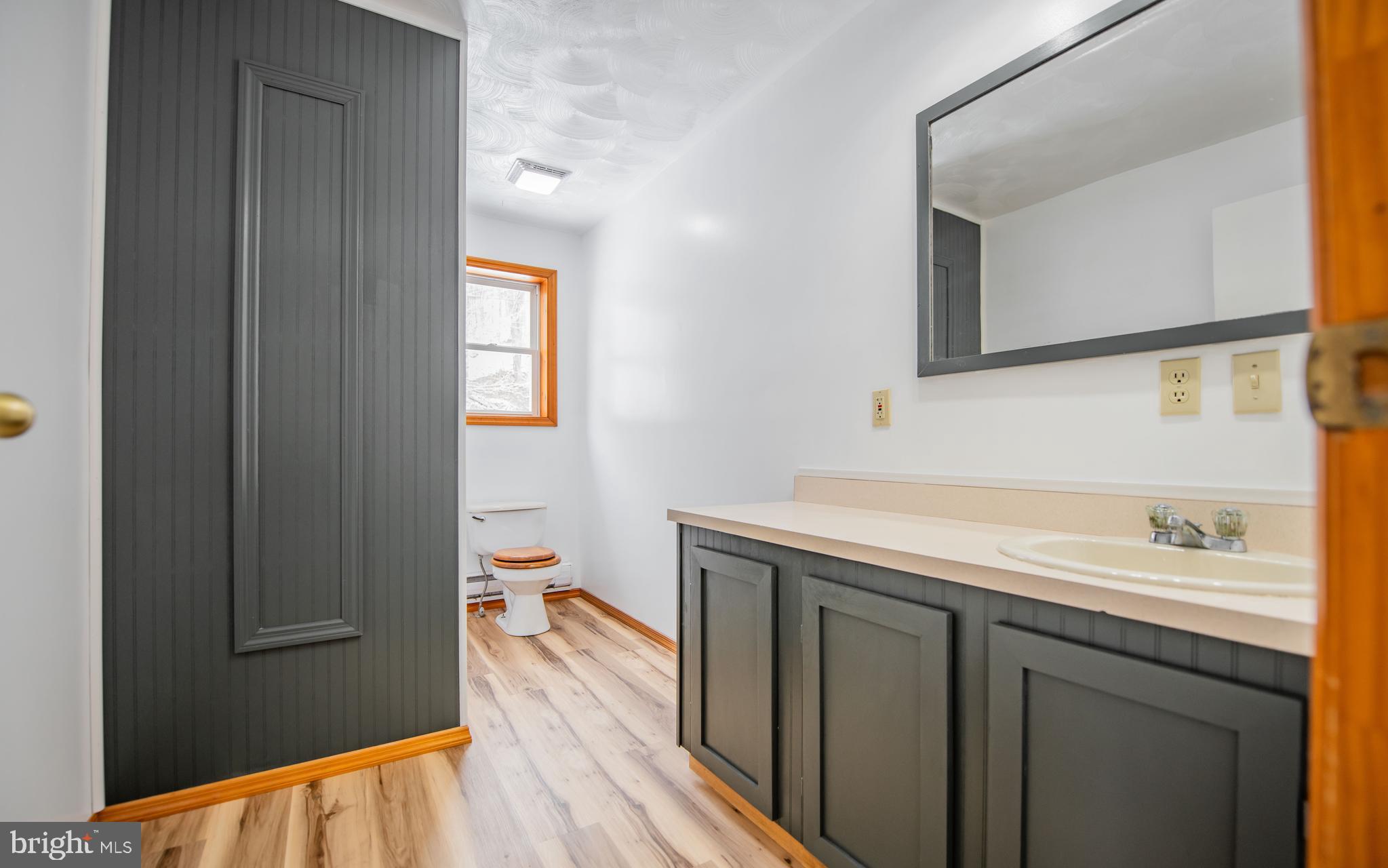 749 Farrandsville Road Lock Haven, PA 17745 - Photo 6 of 25 a kitchen with a sink and a refrigerator