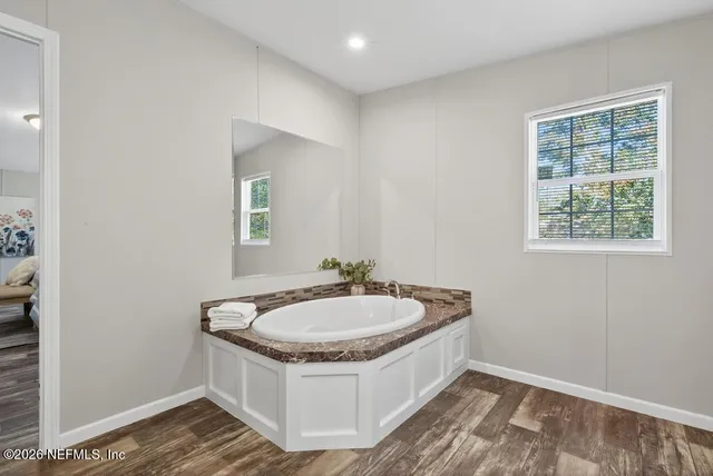 a view of outdoor space with deck and yard