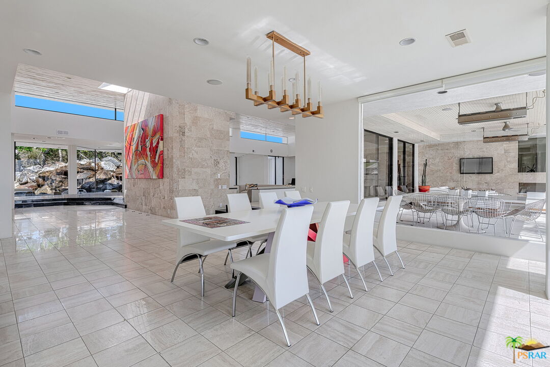 700 West Stevens Road Palm Springs, CA 92262 - Photo 17 of 54 a view of a dining room with furniture