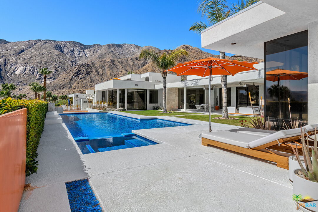 700 West Stevens Road Palm Springs, CA 92262 - Photo 27 of 54 a view of an chairs and table in the patio