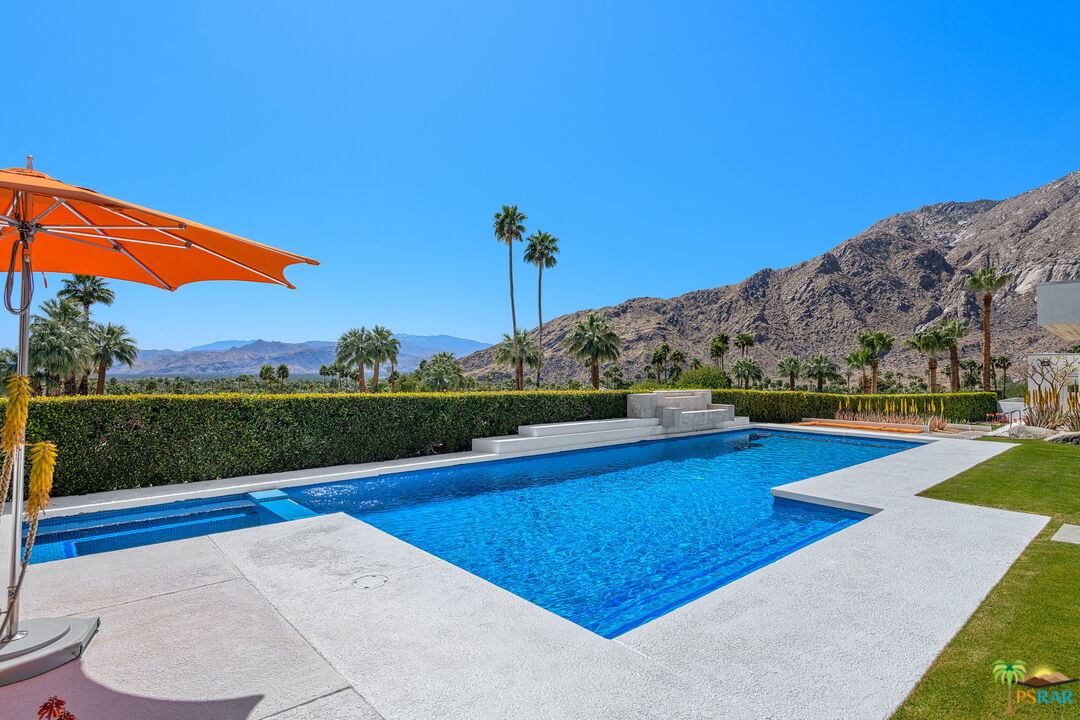 700 West Stevens Road Palm Springs, CA 92262 - Photo 28 of 54 a view of swimming pool with outdoor seating and yard