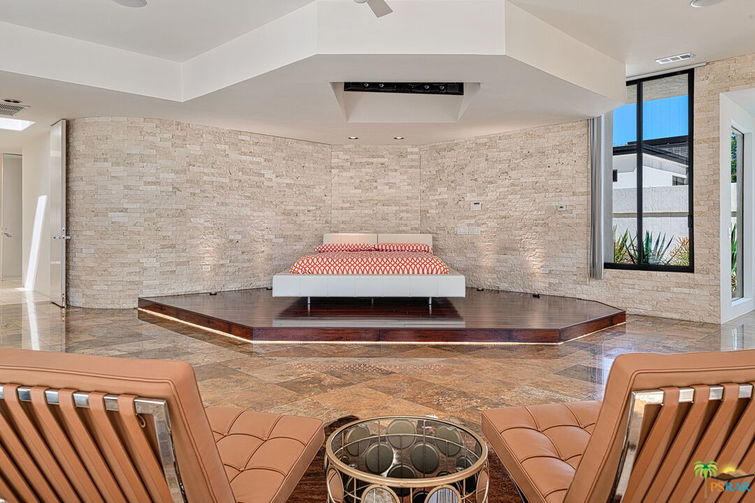 700 West Stevens Road Palm Springs, CA 92262 - Photo 35 of 54 a living room with a rug