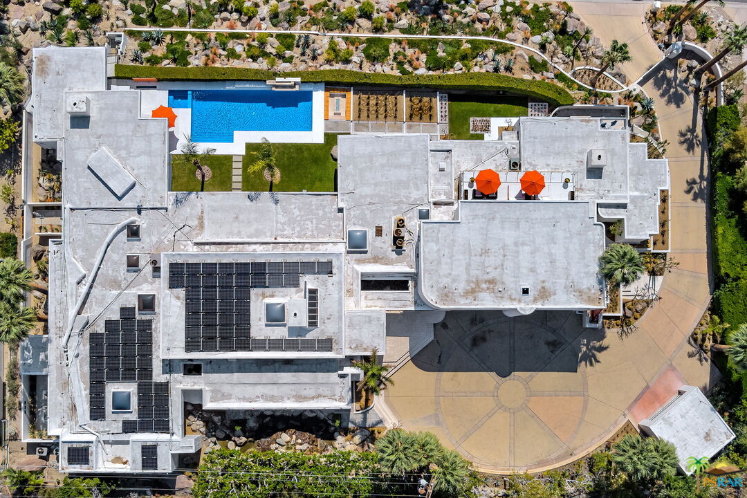 700 West Stevens Road Palm Springs, CA 92262 - Photo 47 of 54 an aerial view of a house with a swimming pool