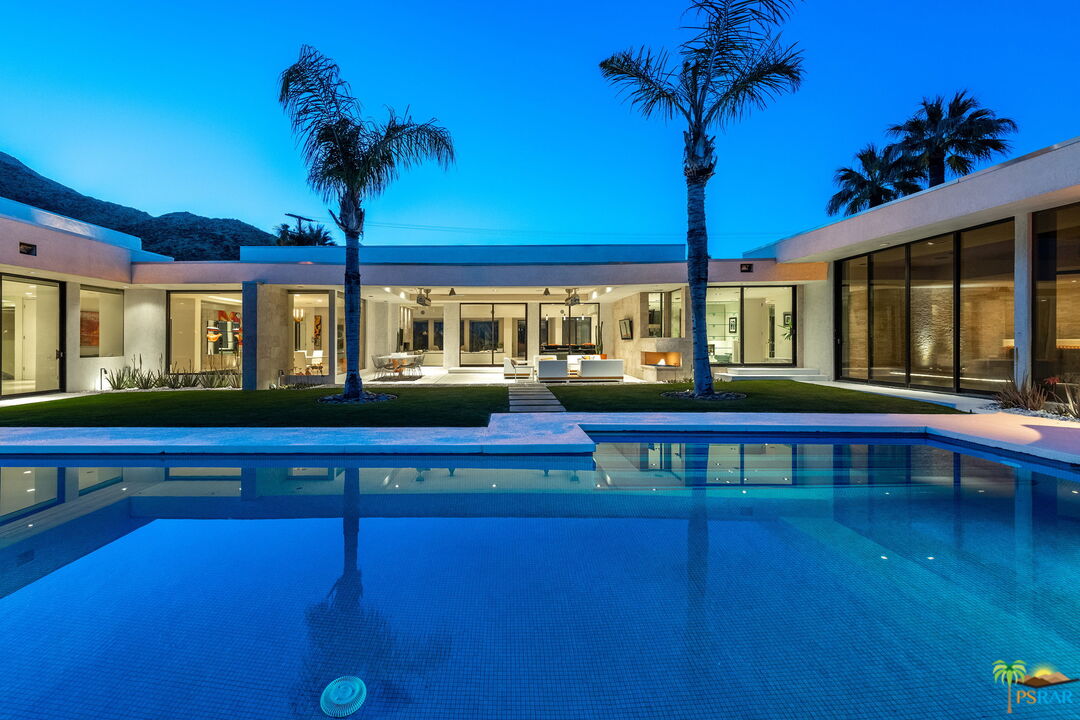 700 West Stevens Road Palm Springs, CA 92262 - Photo 49 of 54 a view of a house with a swimming pool