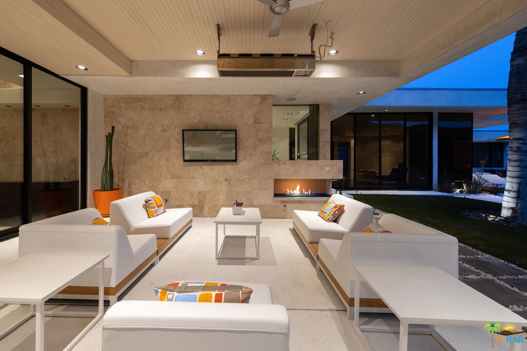 700 West Stevens Road Palm Springs, CA 92262 - Photo 52 of 54 a living room with furniture and a flat screen tv