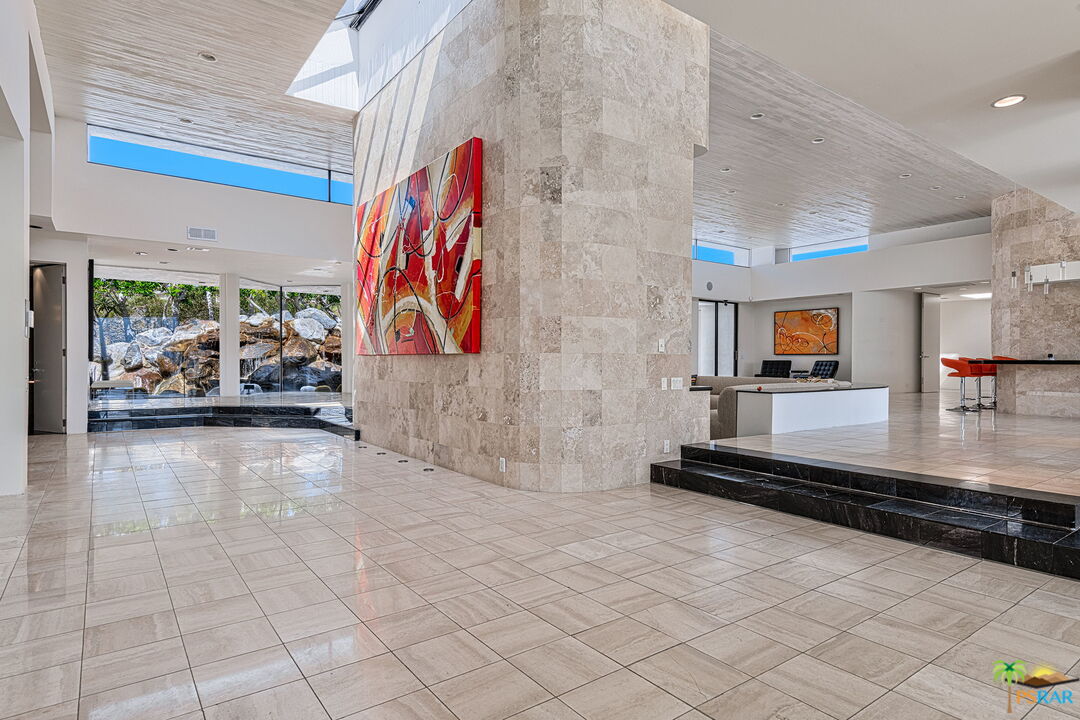 700 West Stevens Road Palm Springs, CA 92262 - Photo 9 of 54 a view of a room with gym equipment