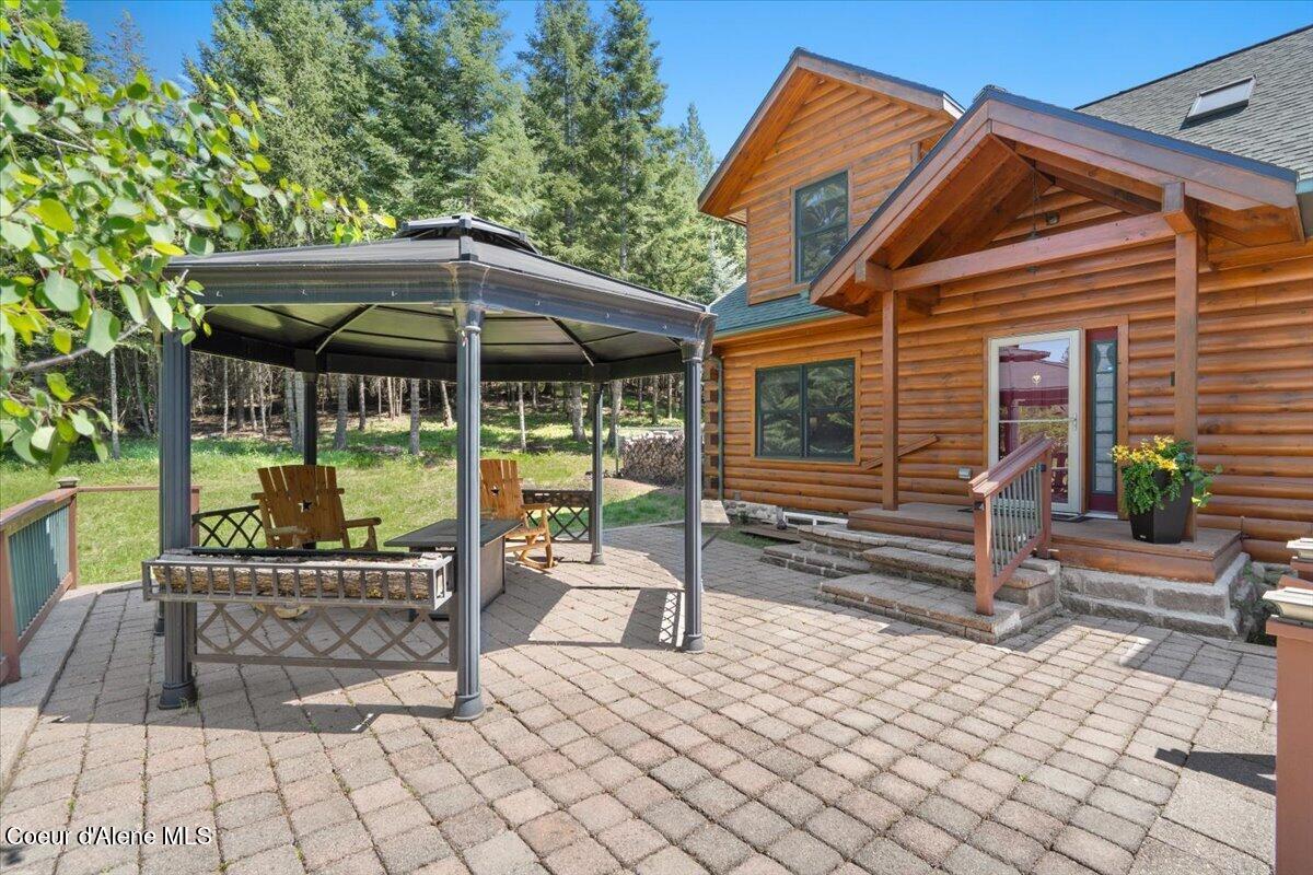 13764 South Ridgeview Drive Harrison, ID 83833 - Photo 2 of 60 11-Front patio & entry