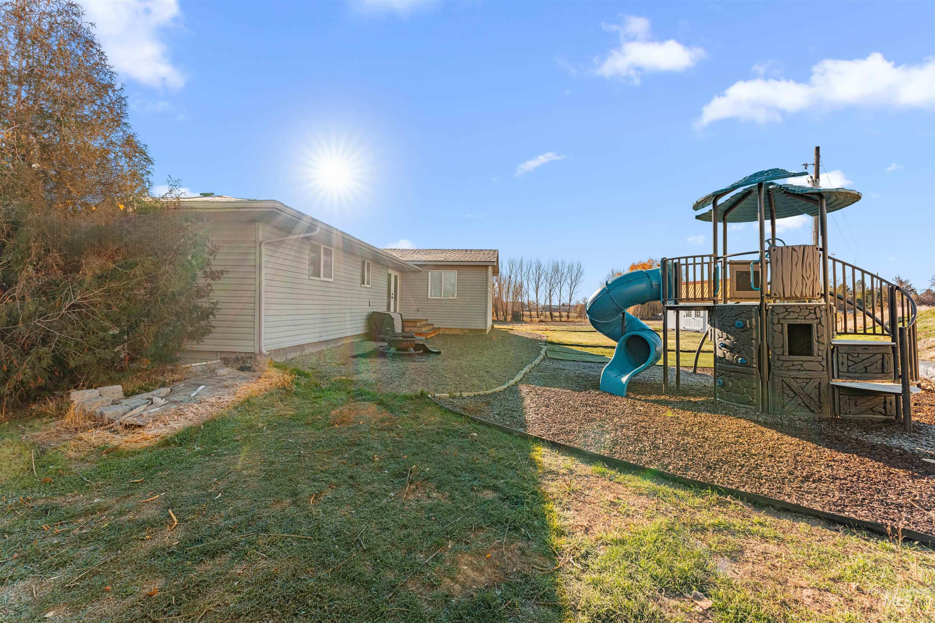 24141 Wanda Way Middleton, ID 83644 - Photo 12 of 20 View of playground featuring a yard