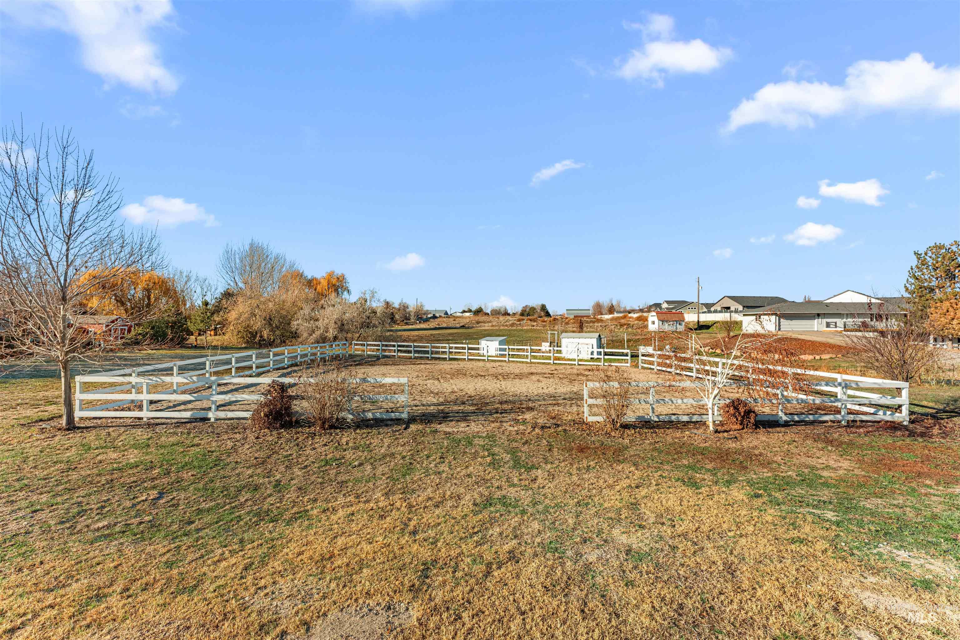 24141 Wanda Way Middleton, ID 83644 - Photo 16 of 20 View of yard featuring a rural view and an enclosed horse arena