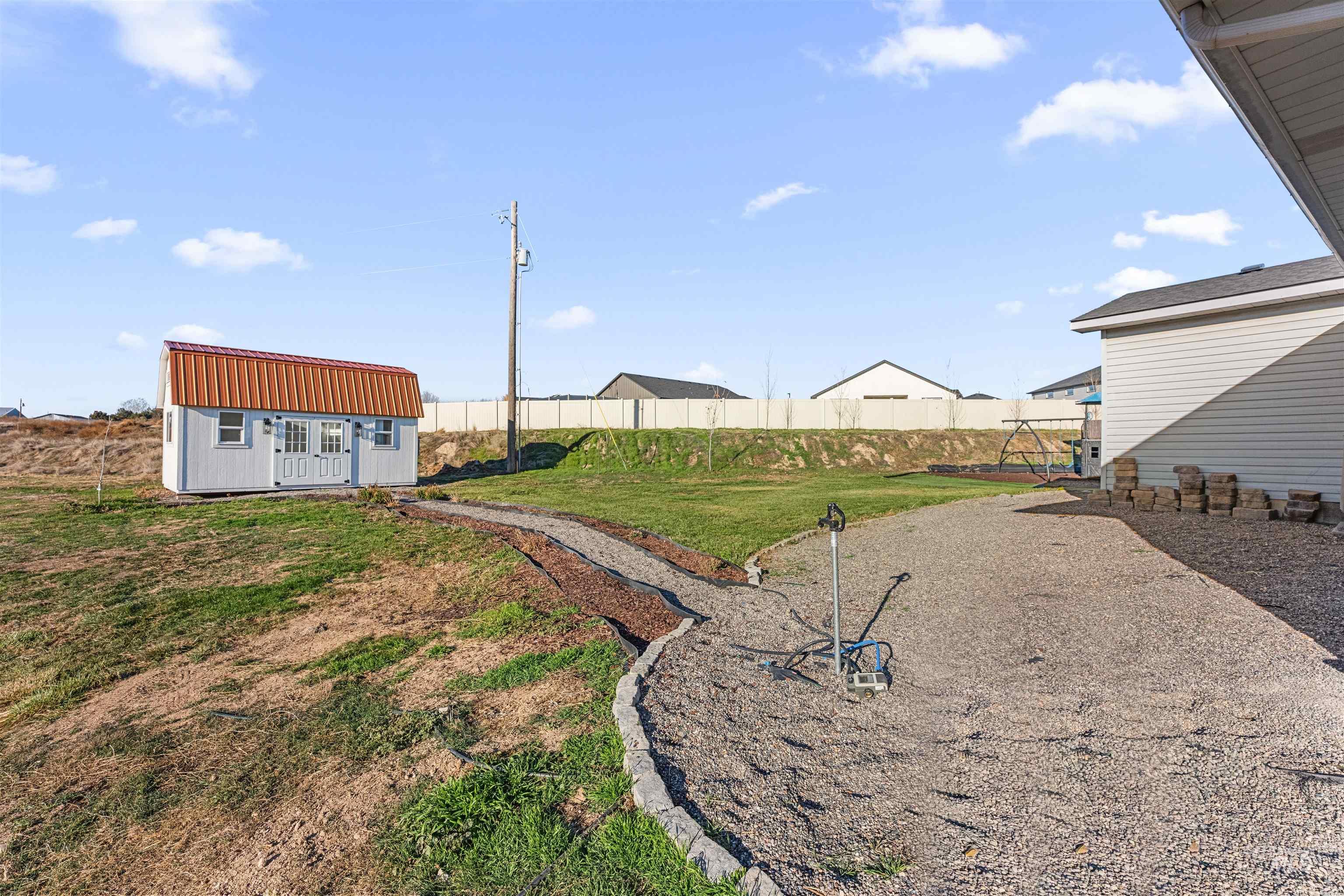 24141 Wanda Way Middleton, ID 83644 - Photo 20 of 20 Fenced yard featuring a shed