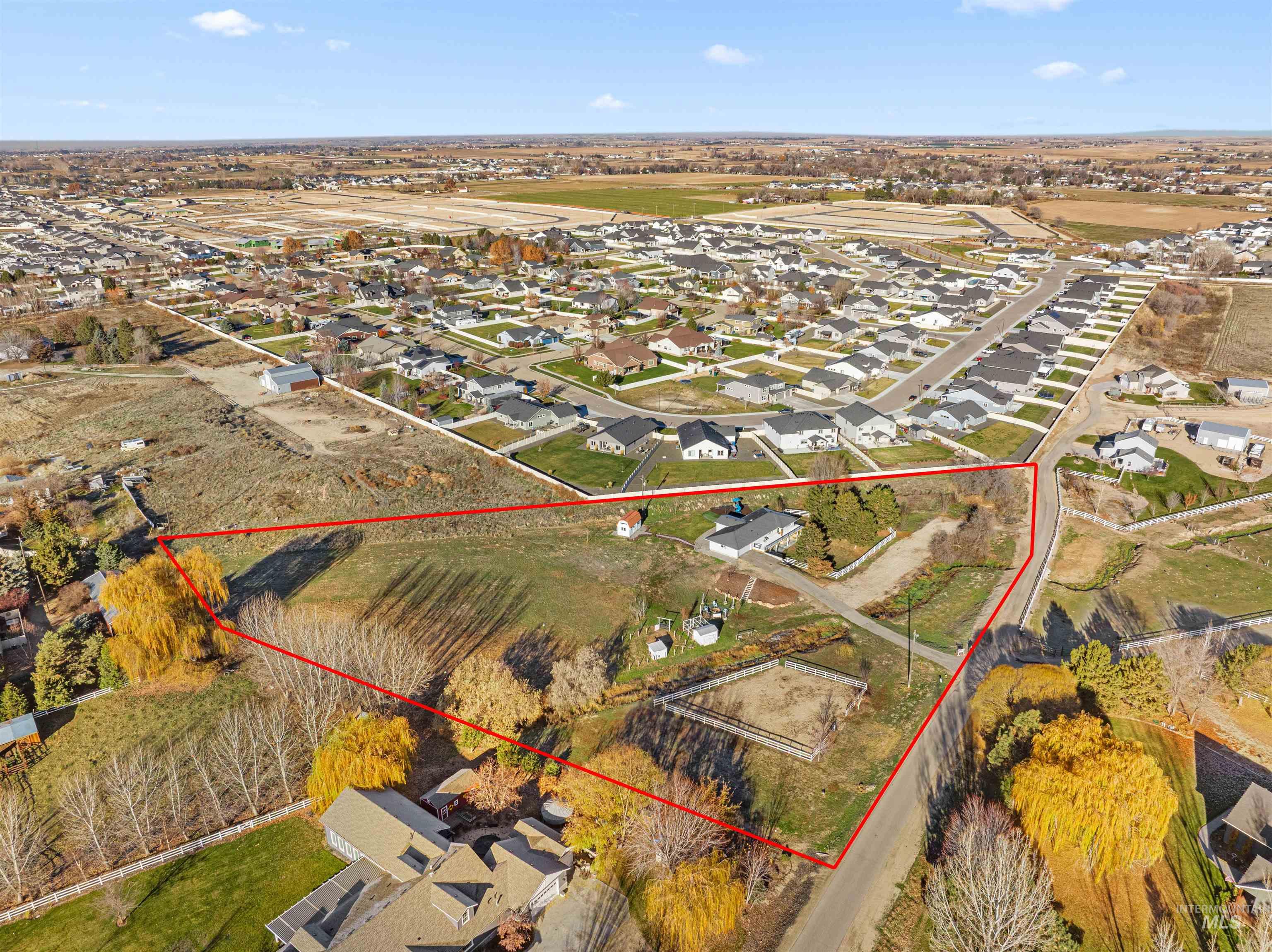 24141 Wanda Way Middleton, ID 83644 - Photo 3 of 20 Aerial view of residential area with property parcel outlined