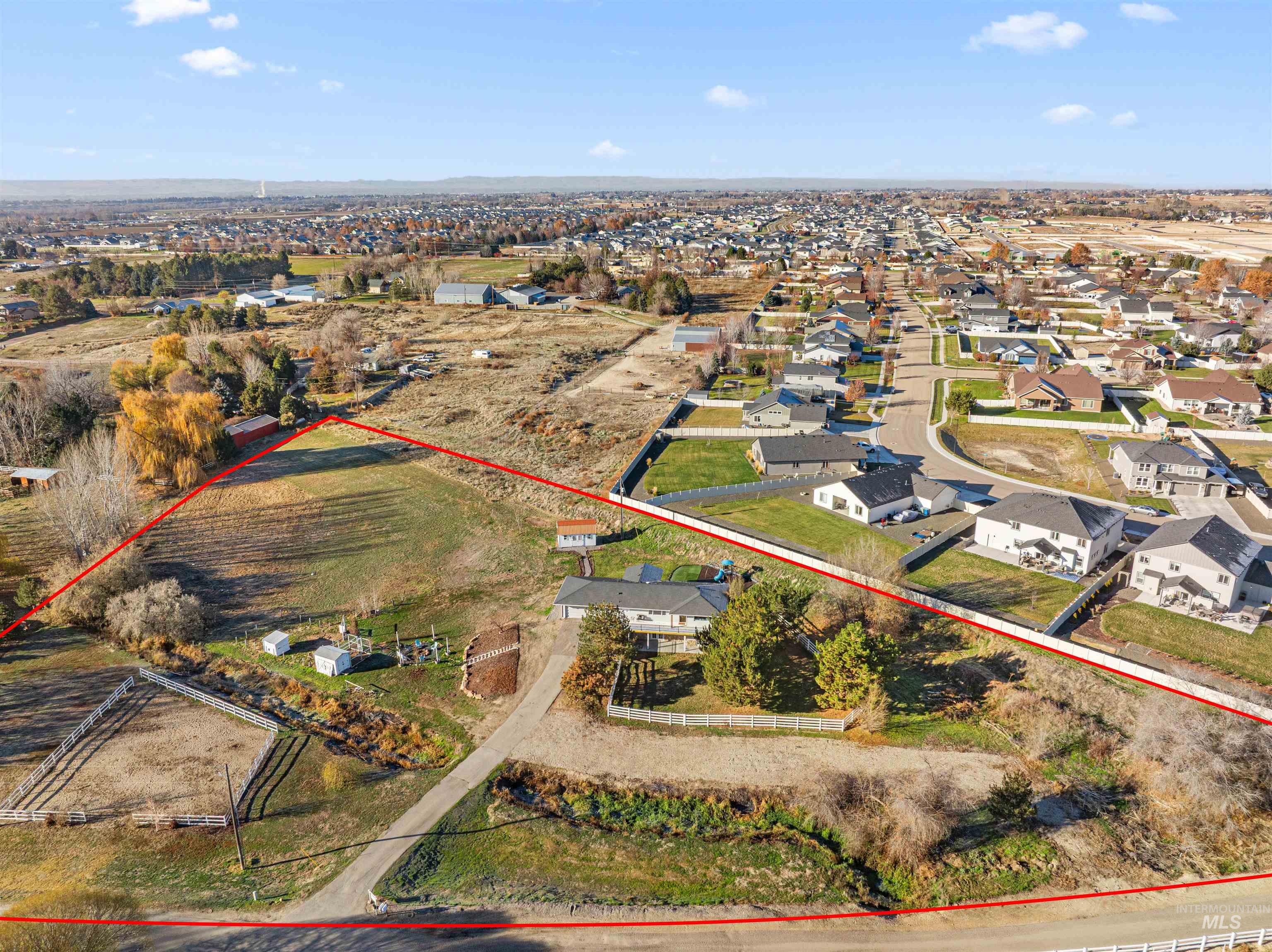 24141 Wanda Way Middleton, ID 83644 - Photo 4 of 20 Aerial view of residential area featuring property parcel outlined