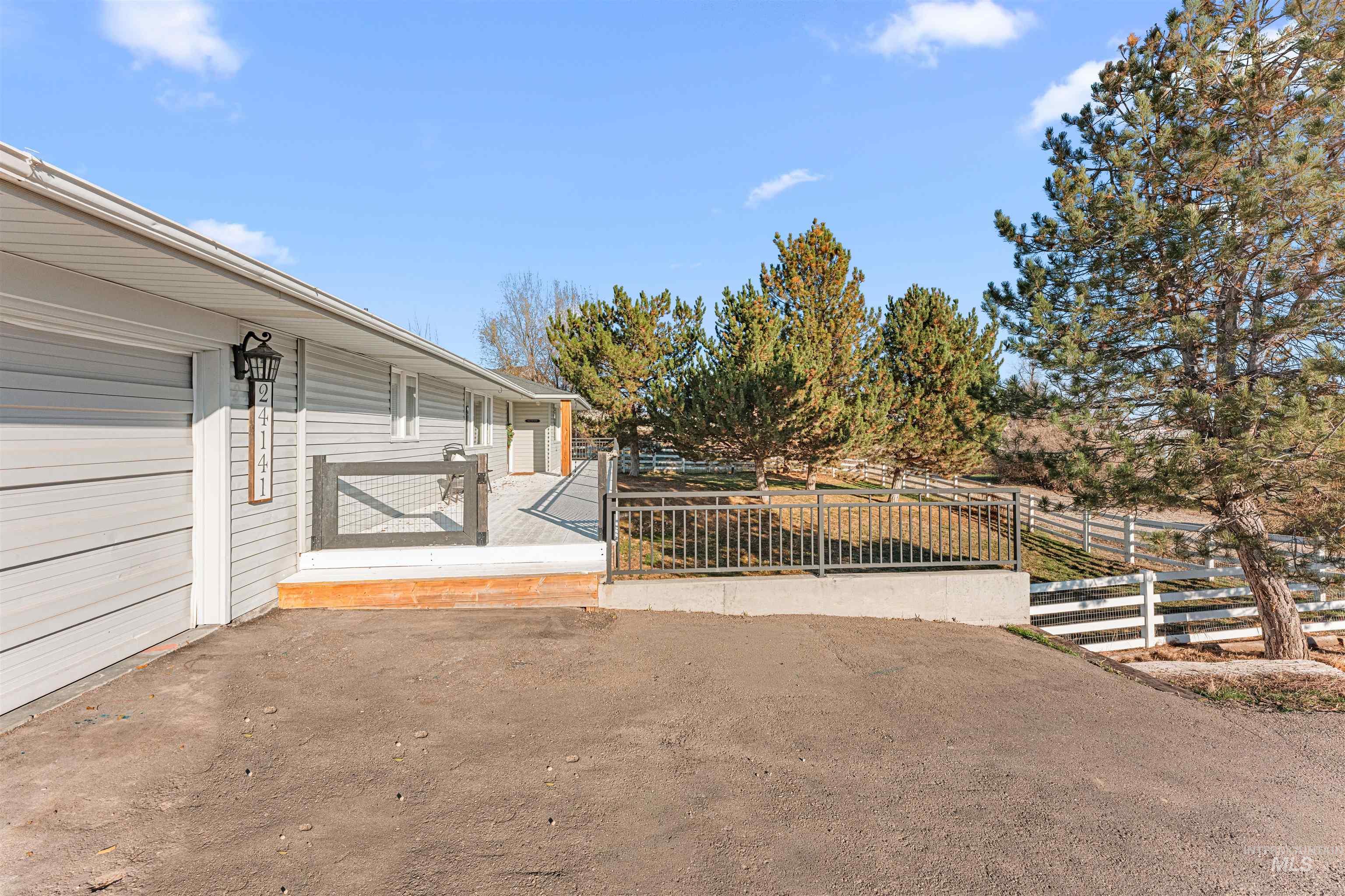 24141 Wanda Way Middleton, ID 83644 - Photo 7 of 20 View of front of house with a garage