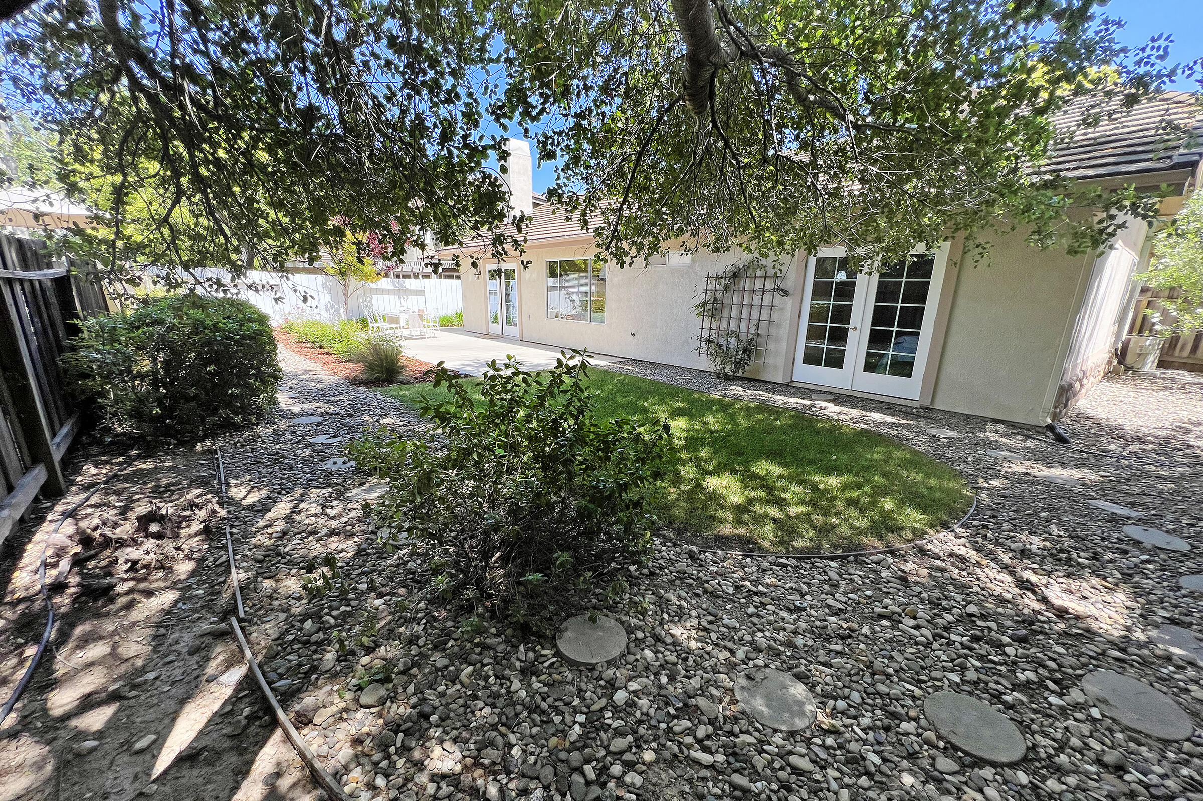 1485 Aarhus Drive Solvang, CA 93463 - Photo 22 of 27 a backyard of a house with lots of green space