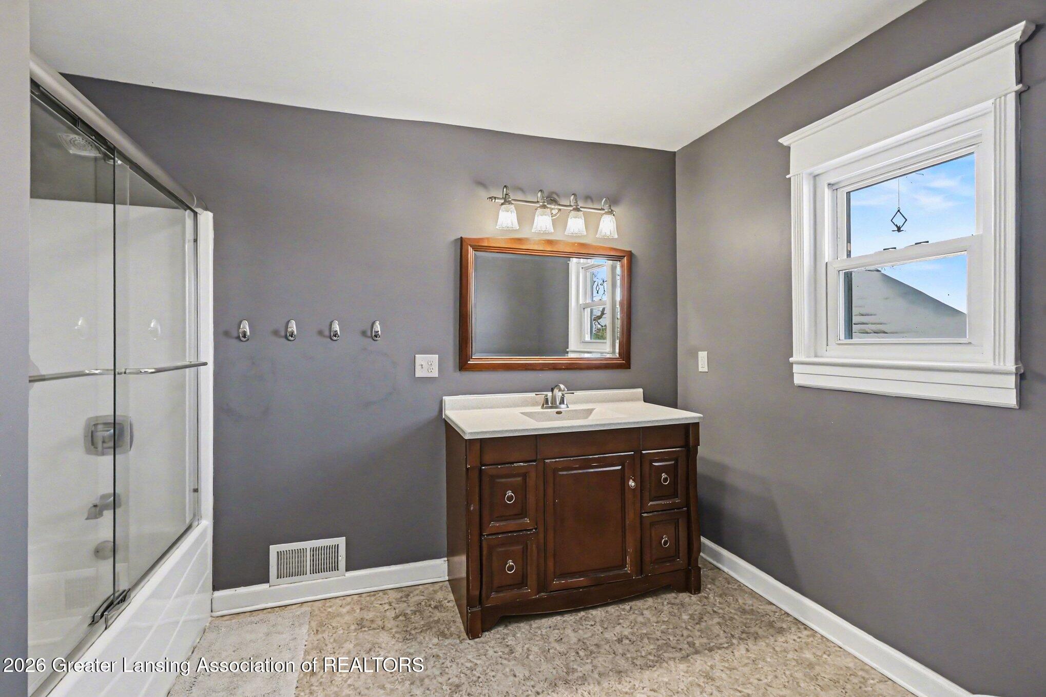 6260 West Chadwick Road Dewitt, MI 48820 - Photo 14 of 32 First Floor Bathroom