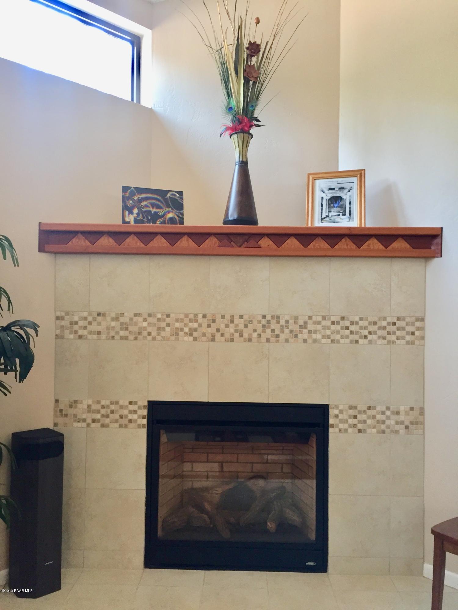 1453 Coyote Road Prescott, AZ 86303 - Photo 16 of 23 1453 Coyote Fireplace