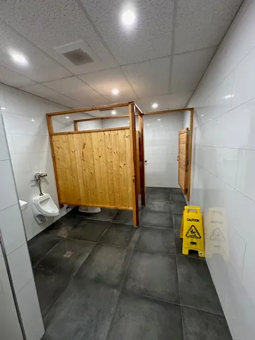 a view of a city street with a building