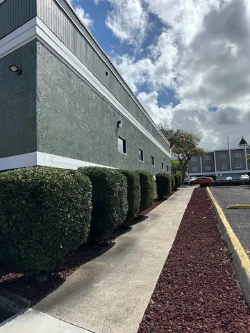 a view of a swimming pool with an outdoor area