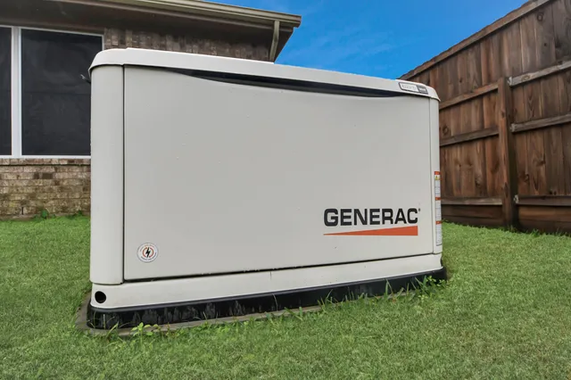 an aerial view of houses with yard