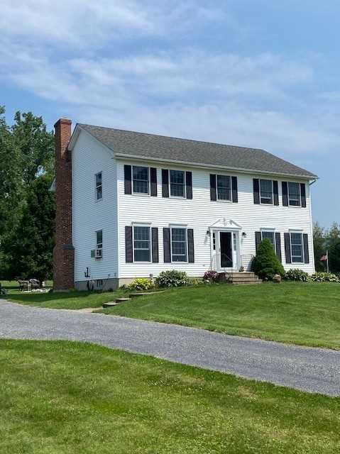 32 Spencer Lane Millerton, NY 12546 - Photo 2 of 29 a front view of a house with a garden