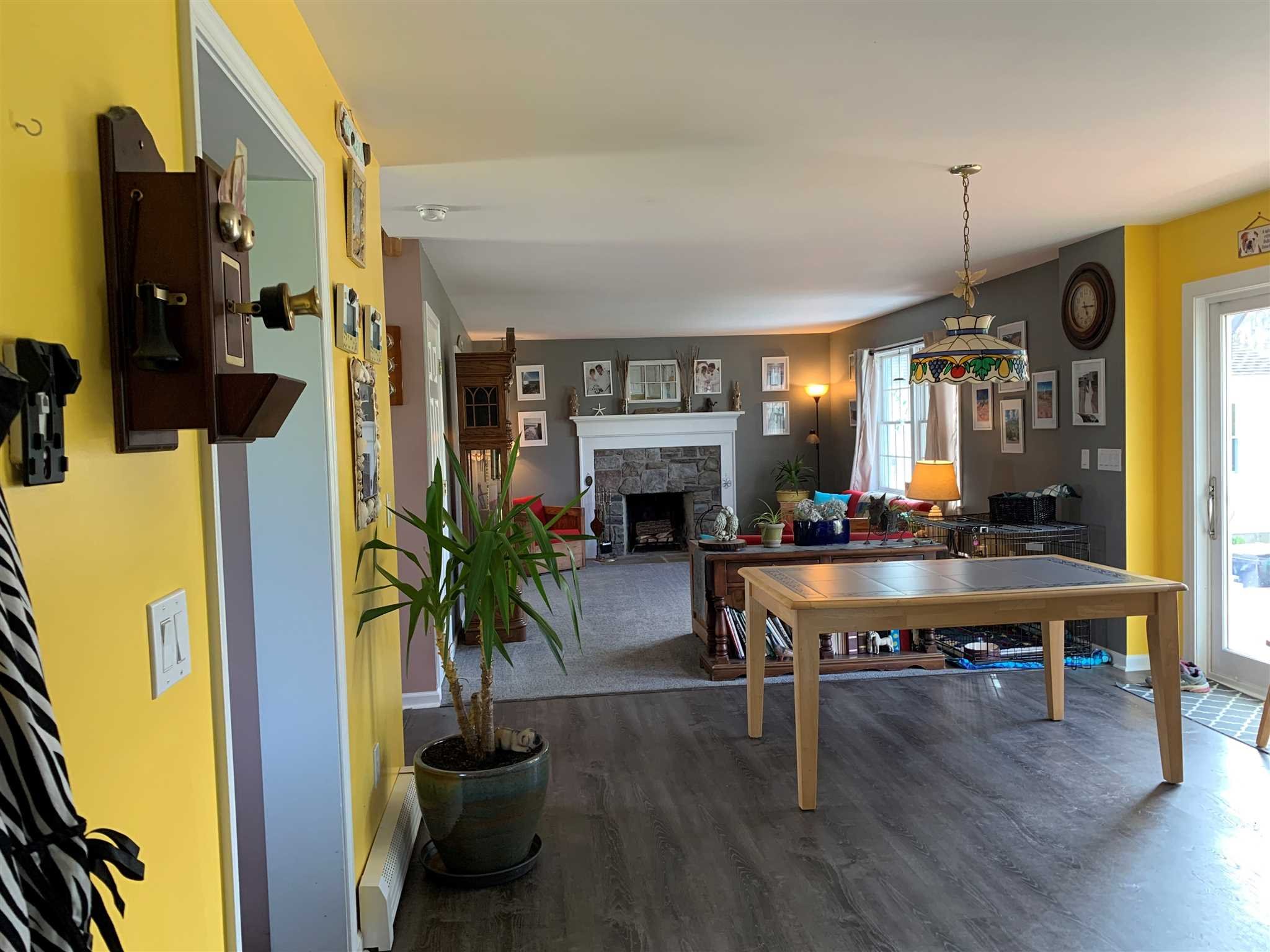 32 Spencer Lane Millerton, NY 12546 - Photo 11 of 29 a living room with furniture a flat screen tv and a fireplace