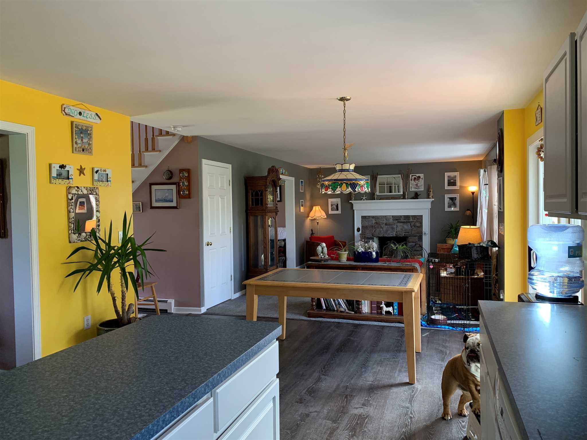 32 Spencer Lane Millerton, NY 12546 - Photo 12 of 29 a living room with furniture a flat screen tv and a potted plant