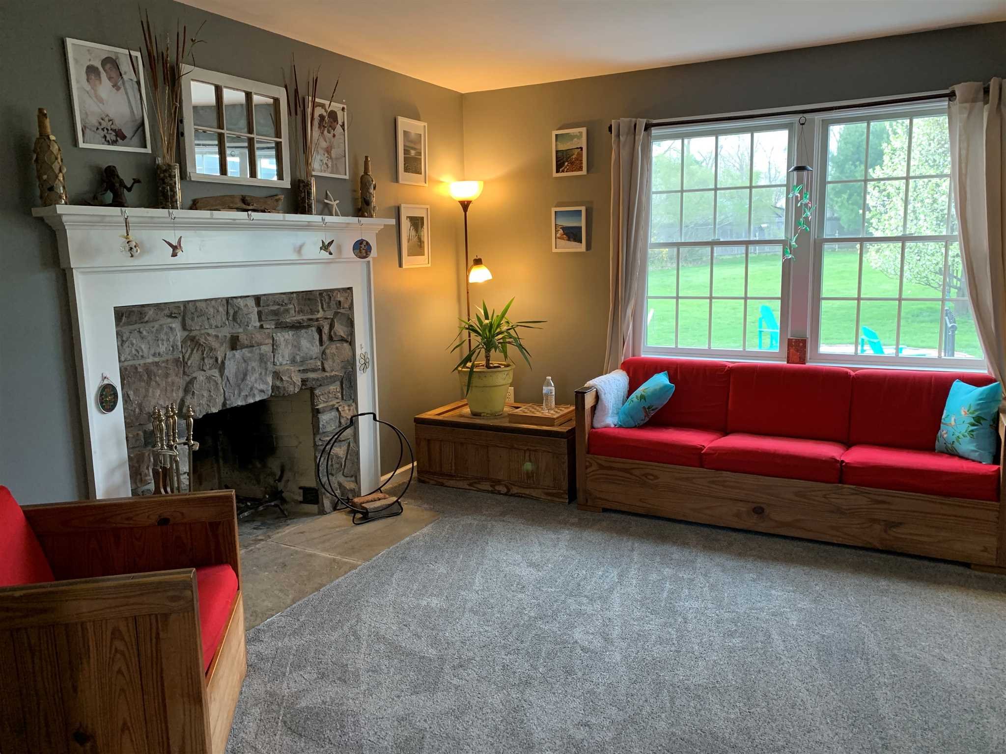 32 Spencer Lane Millerton, NY 12546 - Photo 13 of 29 a living room with furniture and a fireplace