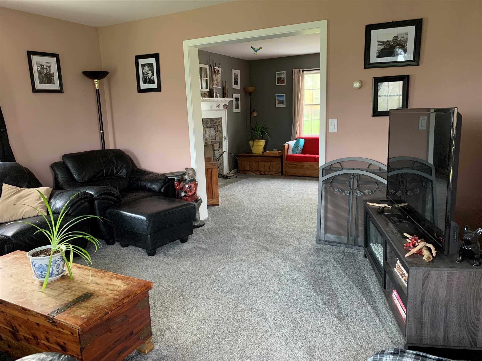 32 Spencer Lane Millerton, NY 12546 - Photo 18 of 29 a living room with furniture and a flat screen tv