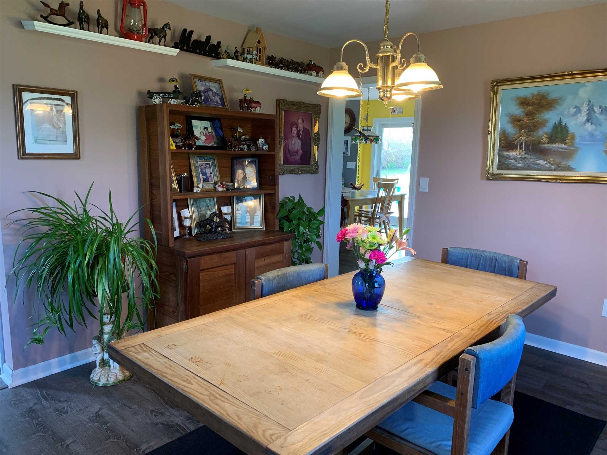 32 Spencer Lane Millerton, NY 12546 - Photo 19 of 29 a view of a dining room with furniture and chandelier