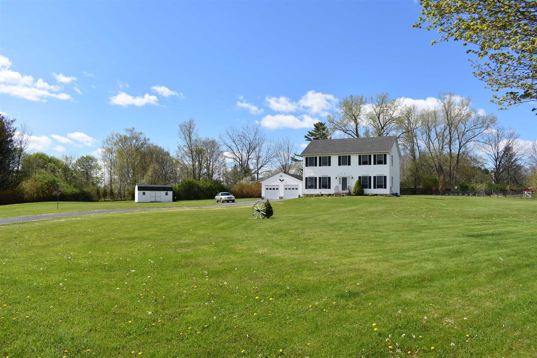 32 Spencer Lane Millerton, NY 12546 - Photo 3 of 29 a front view of a house with garden and trees