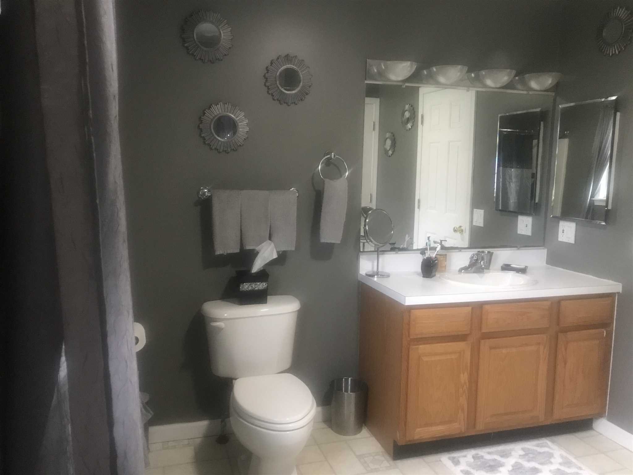 32 Spencer Lane Millerton, NY 12546 - Photo 22 of 29 a bathroom with a toilet sink a mirror and shower