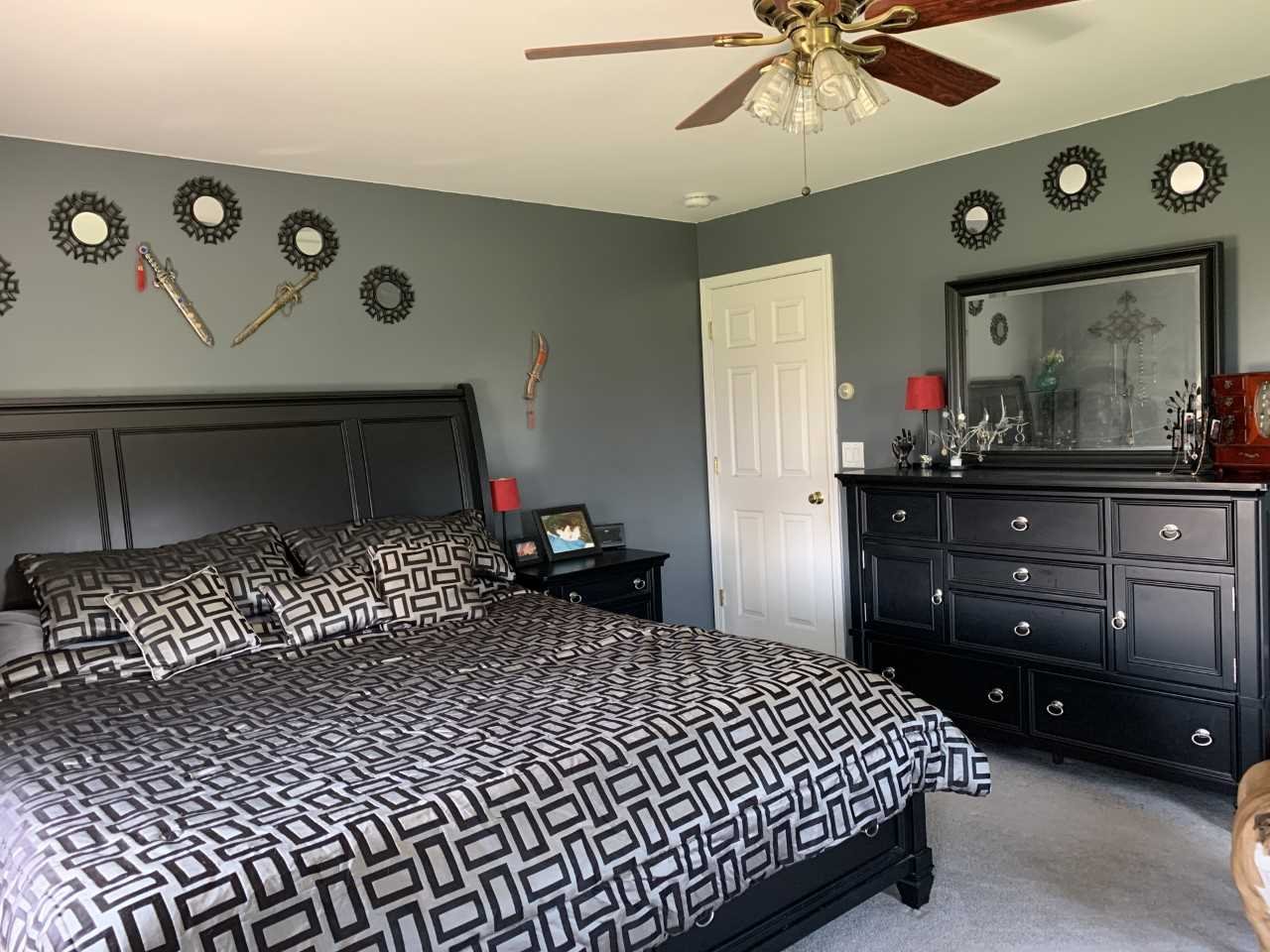 32 Spencer Lane Millerton, NY 12546 - Photo 24 of 29 a bedroom with a bed and a dresser