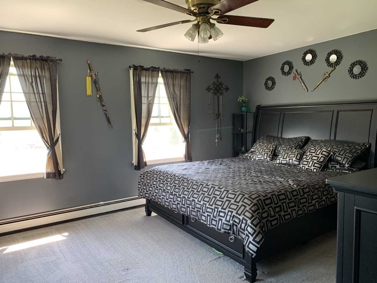 32 Spencer Lane Millerton, NY 12546 - Photo 25 of 29 a bedroom with a bed and window