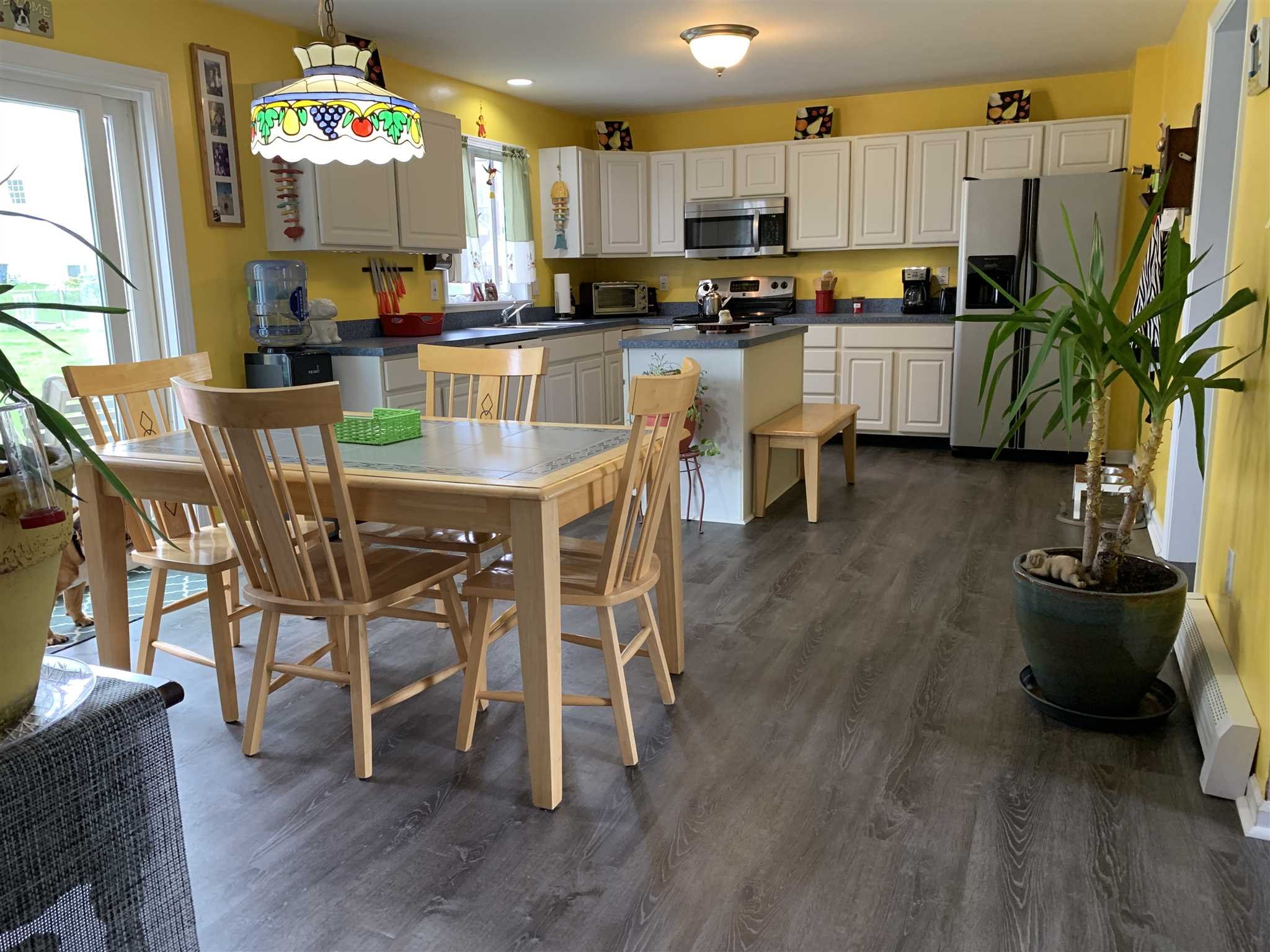 32 Spencer Lane Millerton, NY 12546 - Photo 9 of 29 a kitchen with a table and chairs in it