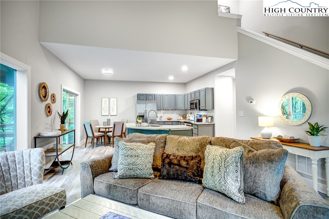 145 Inn At Crestwood Drive Boone, NC 28607 - Photo 11 of 18 a living room with furniture and a table
