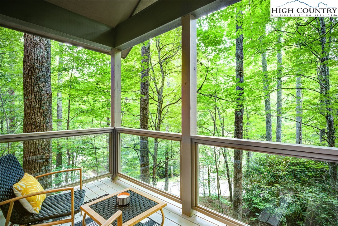 145 Inn At Crestwood Drive Boone, NC 28607 - Photo 2 of 18 a view of a two chairs in balcony
