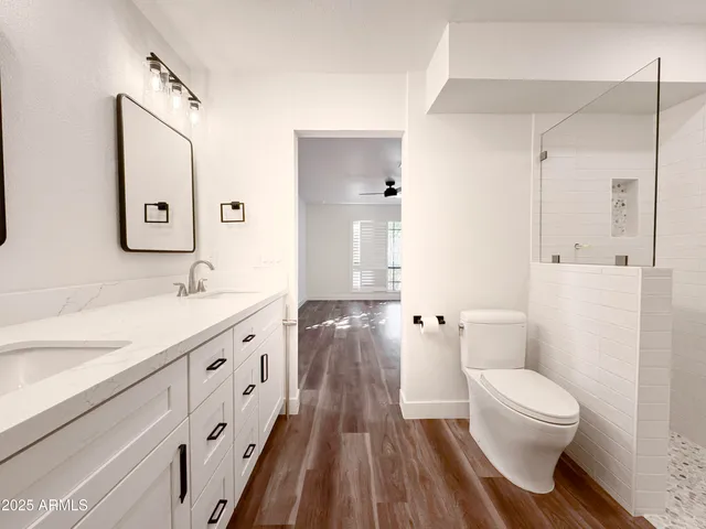 a view of an entryway with wooden floor