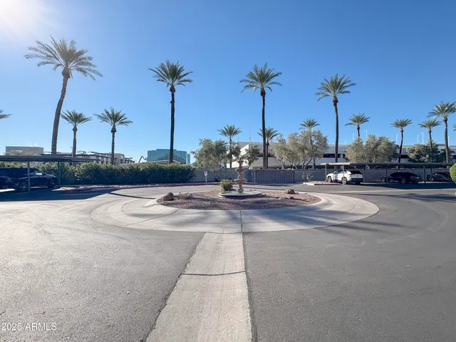 a view of street with parked cars