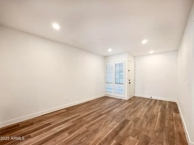 a kitchen with cabinets a sink and appliances