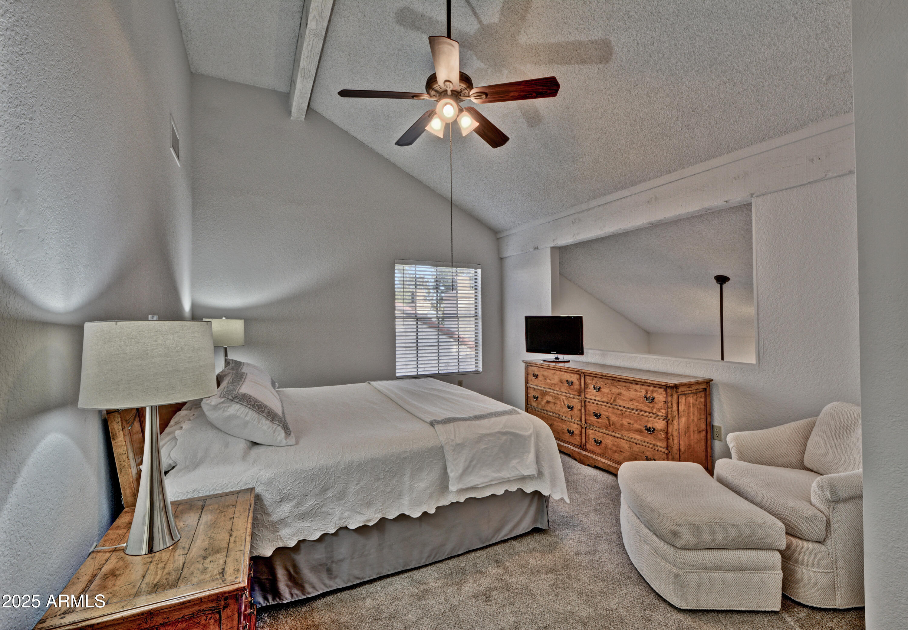 602 North May, Unit 23 Mesa, AZ 85201 - Photo 20 of 25 a bedroom with a bed couch and window