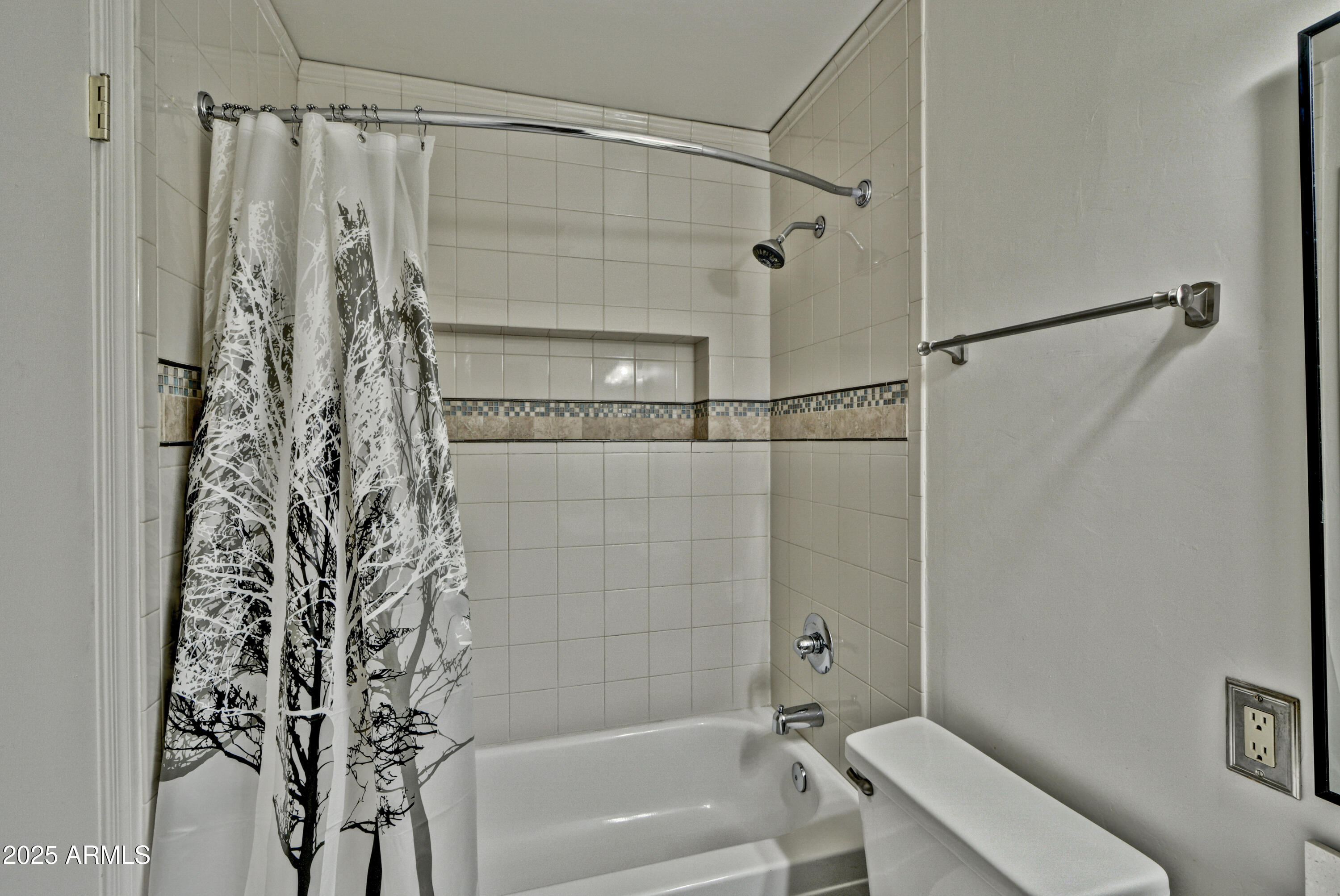 602 North May, Unit 23 Mesa, AZ 85201 - Photo 23 of 25 a bathroom with a shower and a toilet