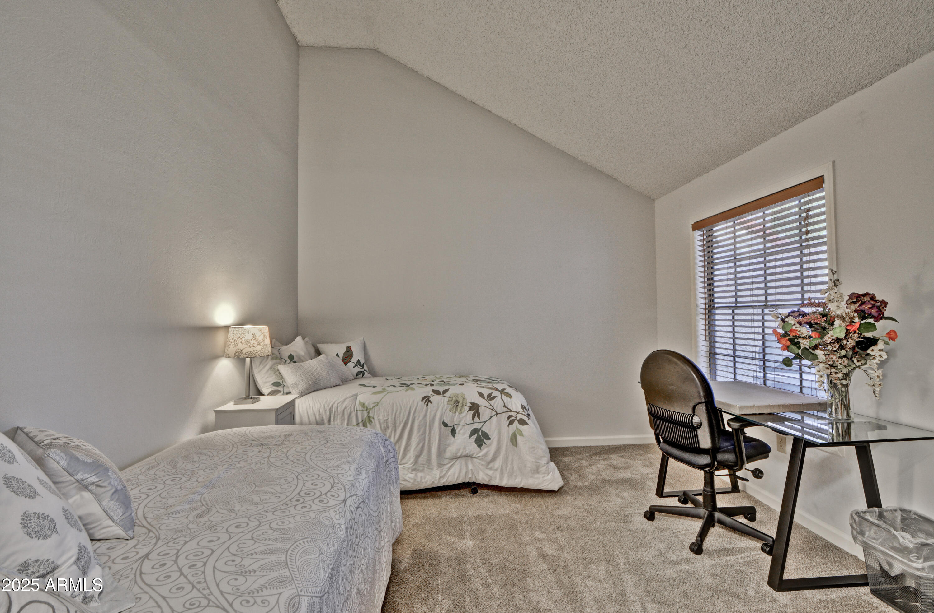 602 North May, Unit 23 Mesa, AZ 85201 - Photo 4 of 25 a bedroom with a bed chair and a window