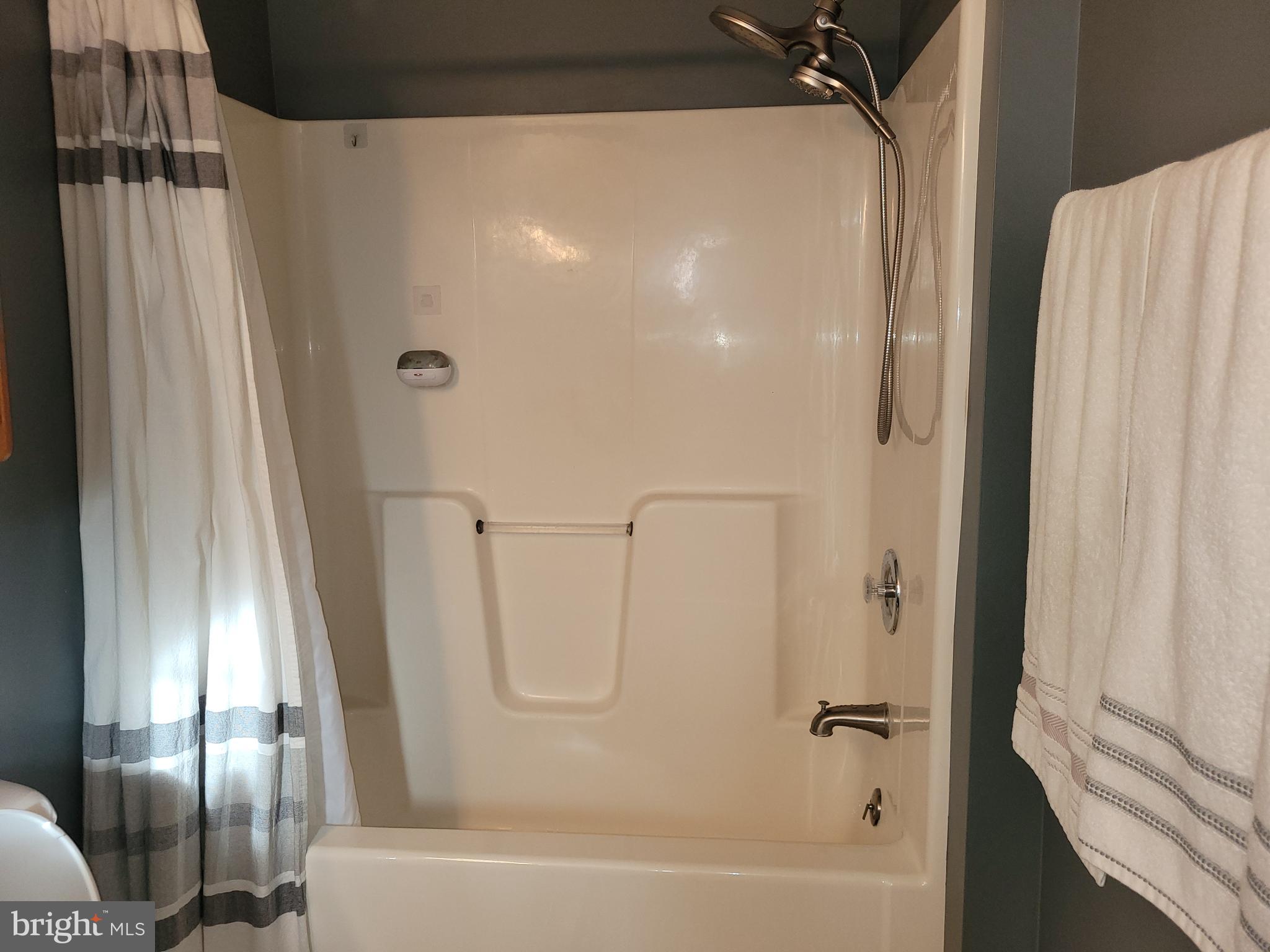 1045 Pond Ridge Drive Harrisburg, PA 17111 - Photo 13 of 25 a bathroom with a shower and a tub