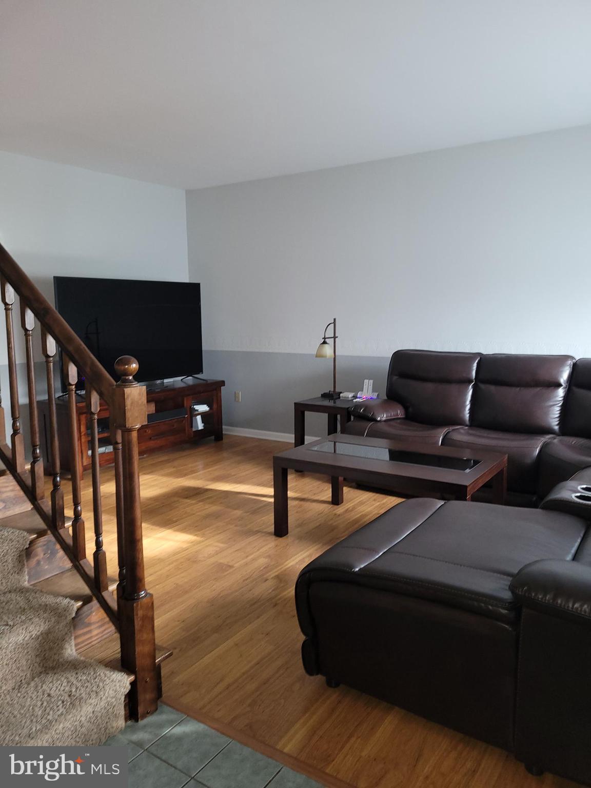 1045 Pond Ridge Drive Harrisburg, PA 17111 - Photo 7 of 25 a living room with furniture and a flat screen tv