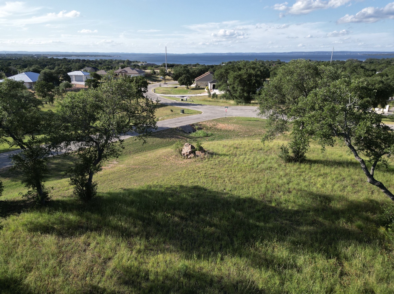 Lot 41 Keystone Ridge Buchanan Dam, TX 78609 - Photo 3 of 10 a view of a lake from a yard